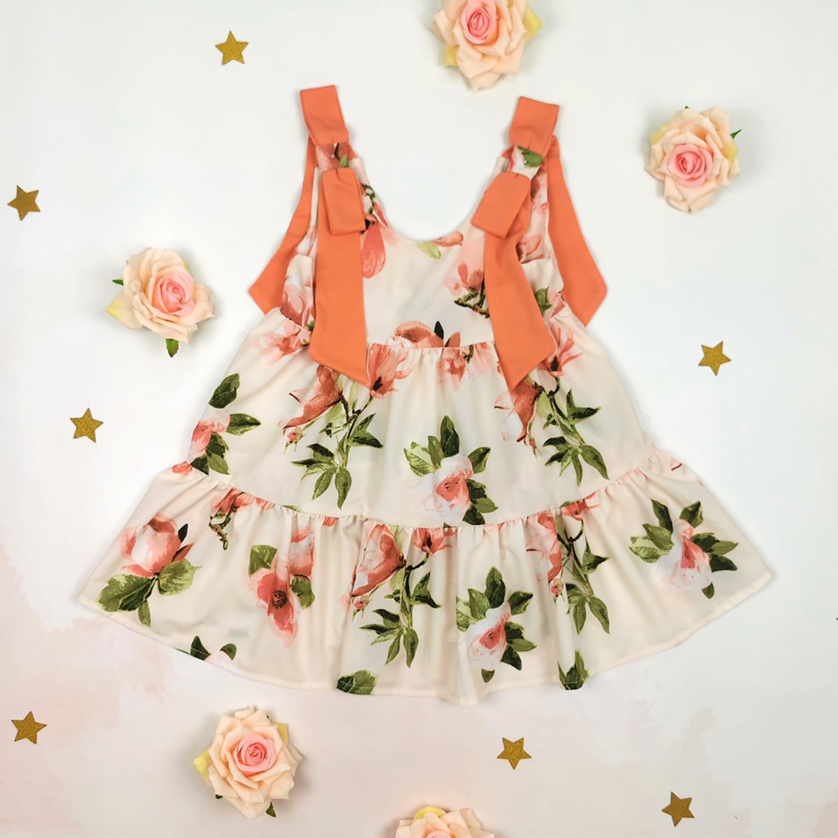 cvjetna haljina s mašnicama na ramenima