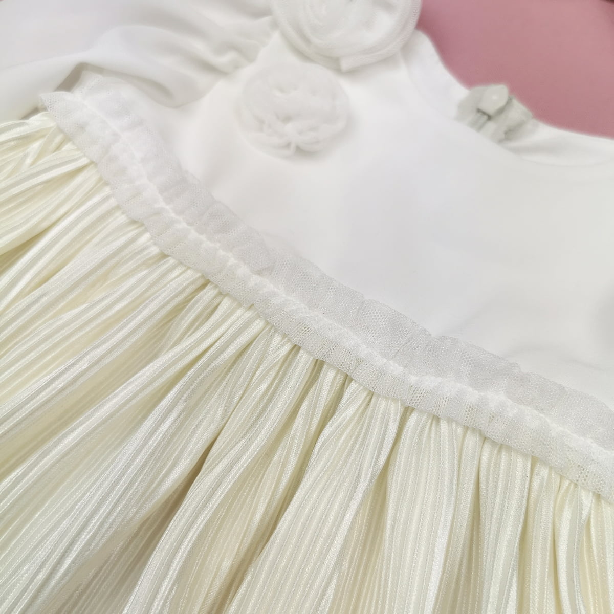detalj haljine za krštenje vanilla sky